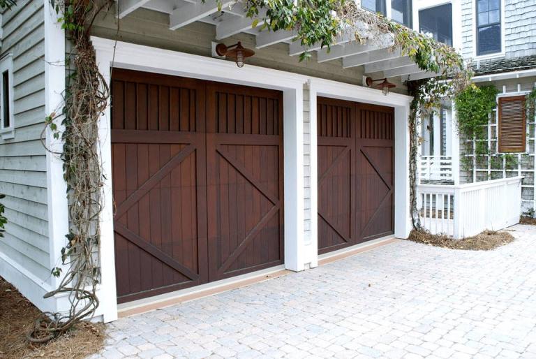 Two wooden garage doors